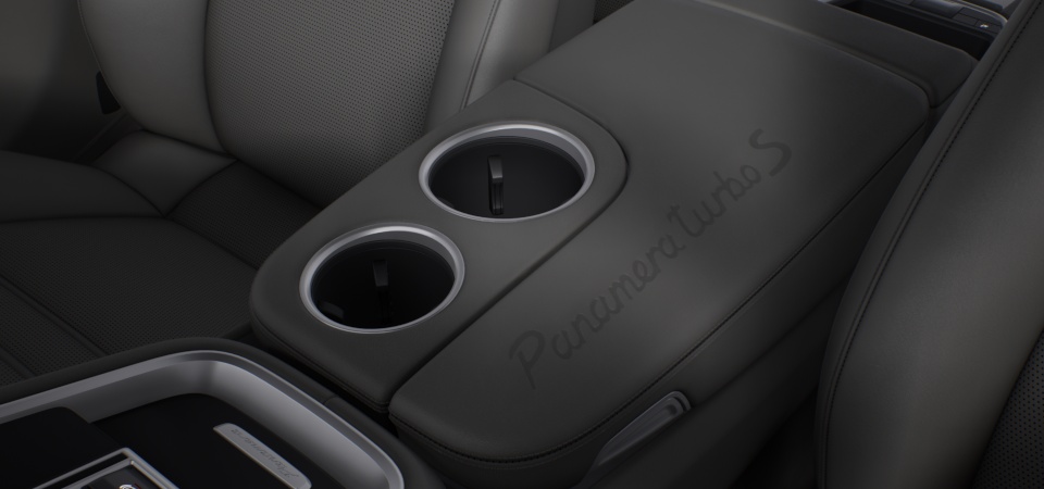 Model logo embossed on centre console armrests