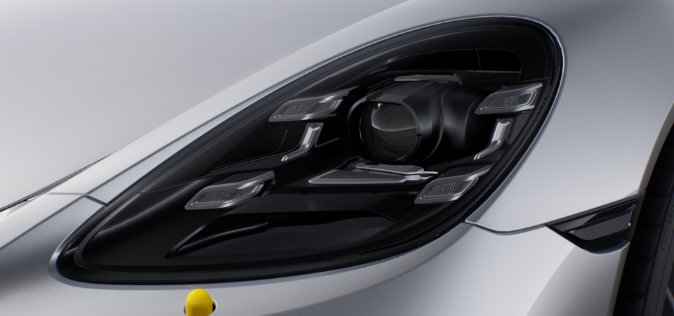 Headlight cleaning system covers painted in deviating exterior colour