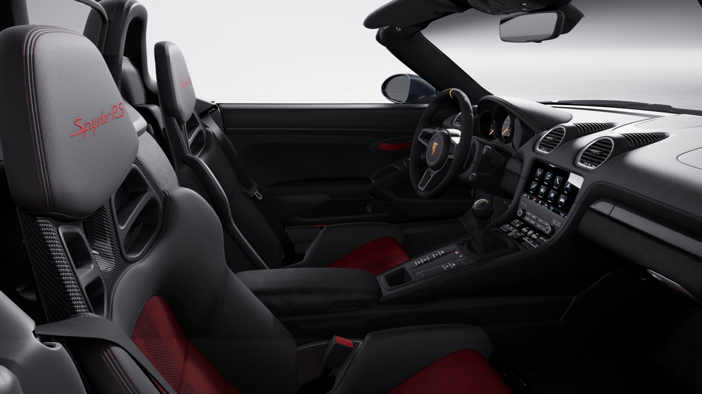 带大量真皮和 Race-Tex 面料部件的黑色-胭脂红双色调内饰