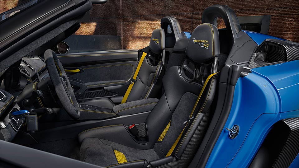 Interior trim package with decorative stitching and embroidery in contrasting colour