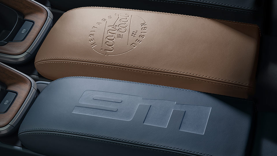 Bespoke Embossing on Center Console Storage Compartment Lid