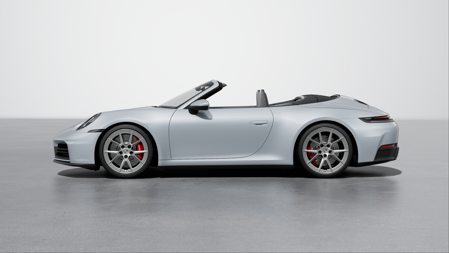 Wheel centre caps with monochrome Porsche crest