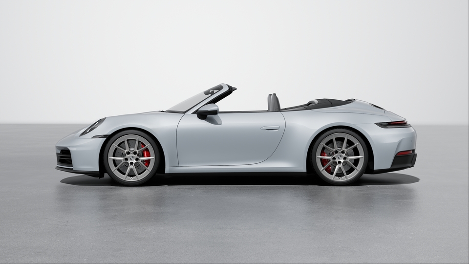Wheel centre caps with monochrome Porsche crest