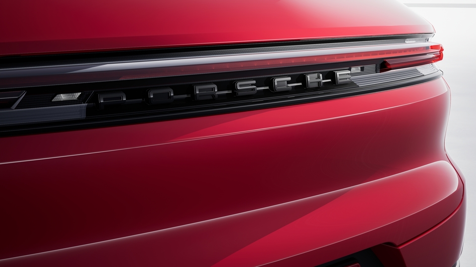 'PORSCHE' logo painted in Black (highgloss) including deletion of model designation