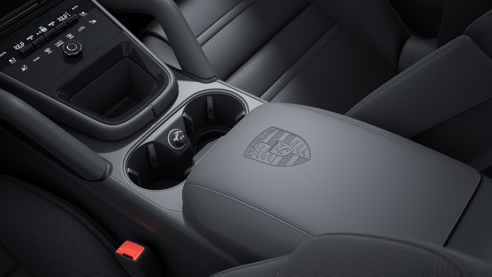 Porsche Crest embossed on centre console armrest