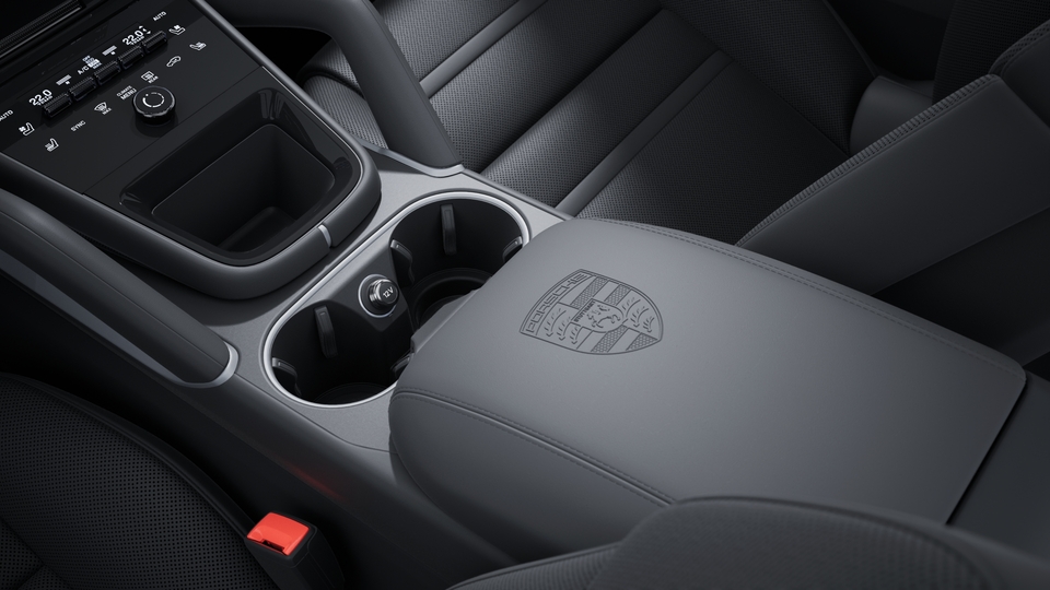 Porsche Crest embossed on centre console armrest