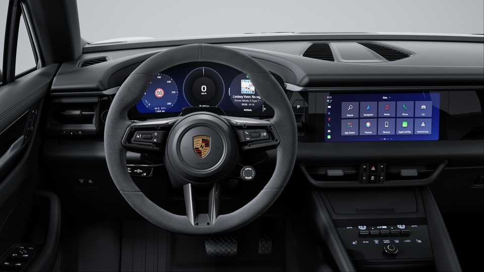 Heated multifunction GT Sports steering wheel in Race-Tex with inlay in carbon