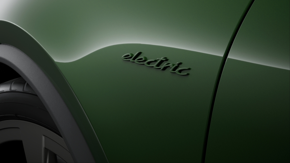 Model designation and 'electric' logo at the side painted in exterior colour