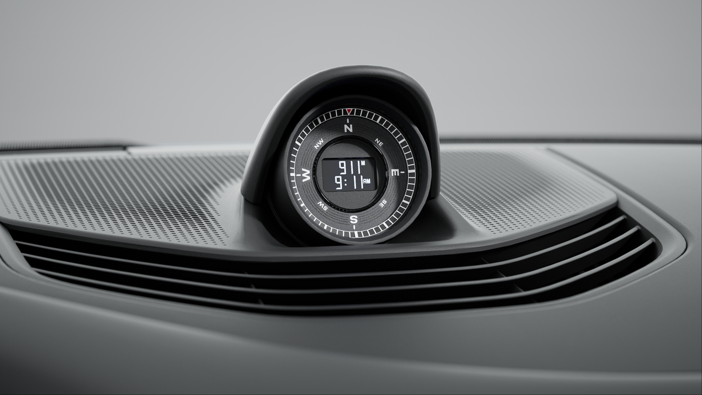 Sport Chrono Package including Push-to-Pass and Track Endurance Mode with compass display on dashboard