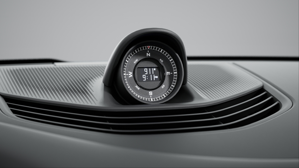 Sport Chrono Package including Push-to-Pass and Track Endurance Mode with compass display on dashboard
