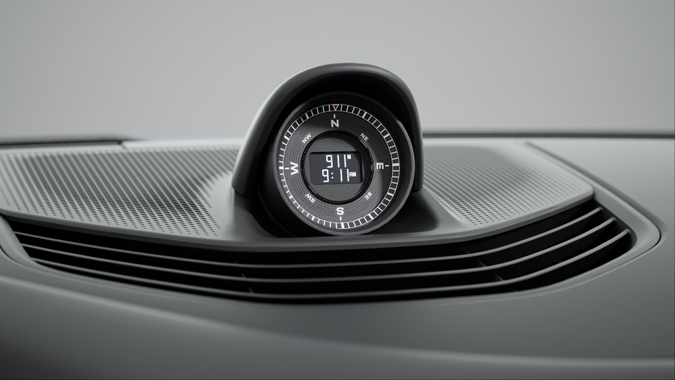 Sport Chrono Package including Push-to-Pass and Track Endurance Mode with compass display on dashboard