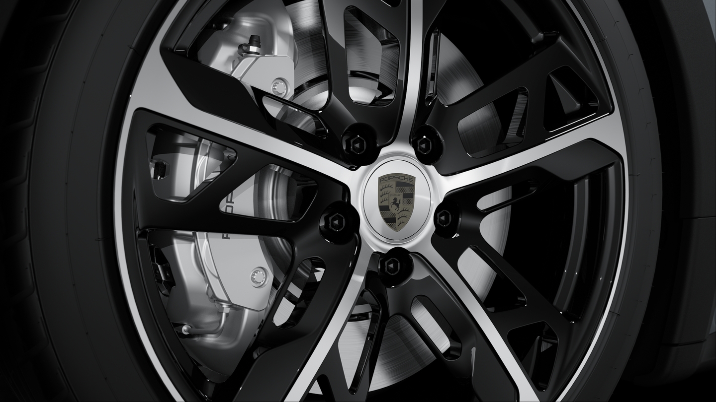 Wheel centre caps with Porsche crest in Turbonite