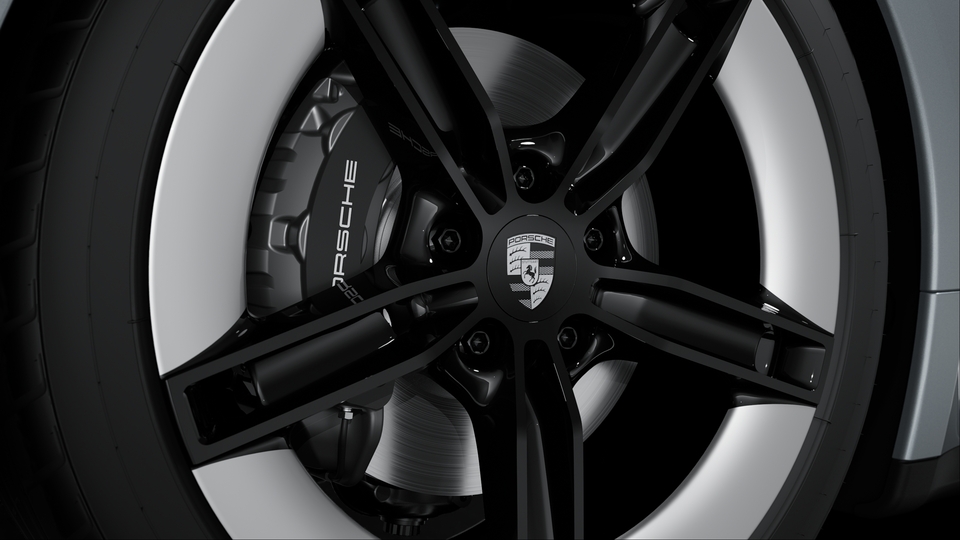 Wheel centre caps with monochrome Porsche crest