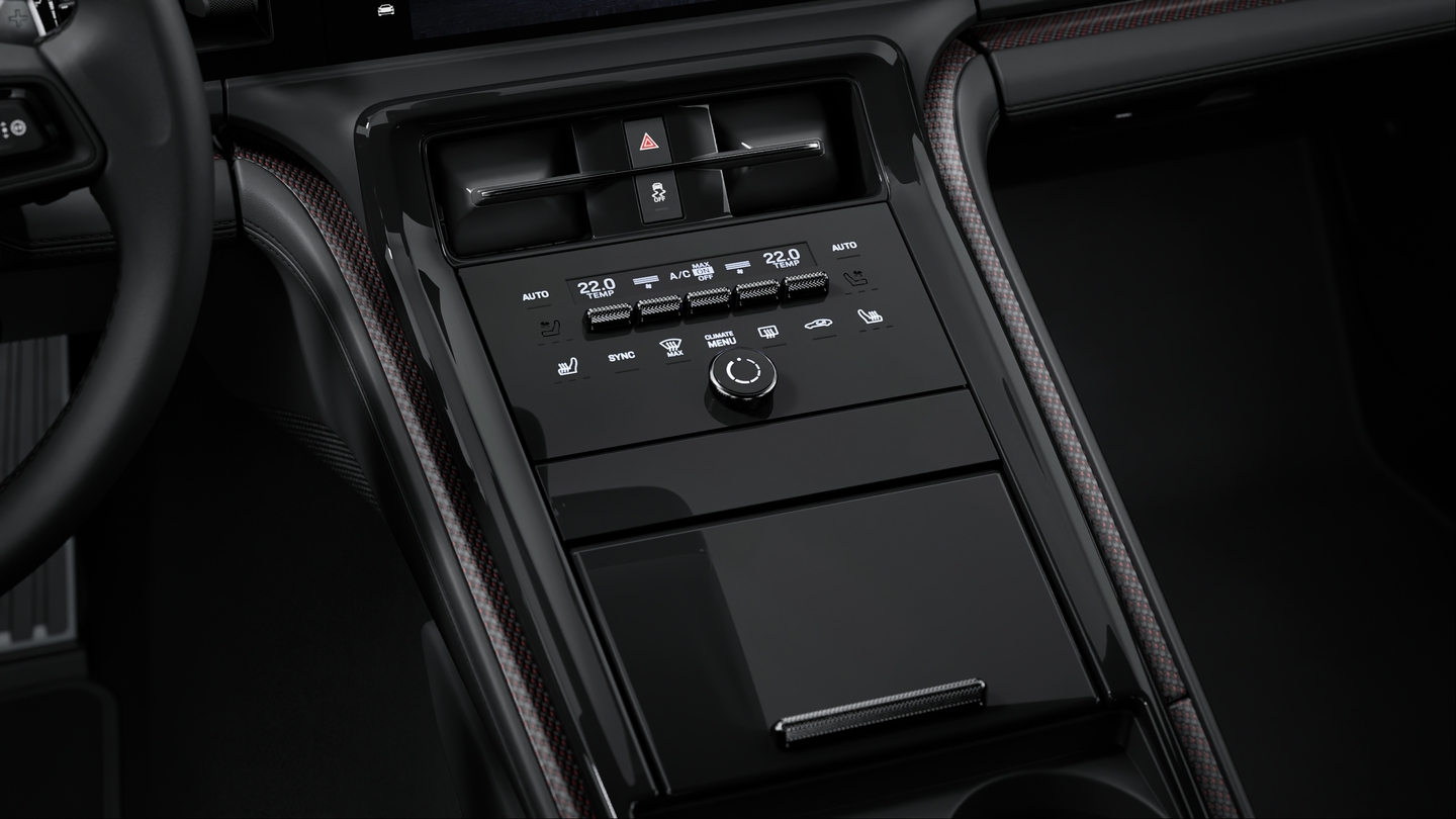 Matt carbon interior package with colour accent in Carmine Red