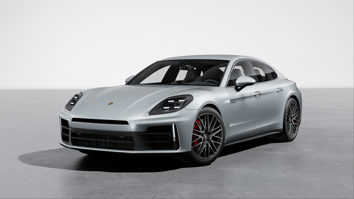 Wheel centre caps with monochrome Porsche crest