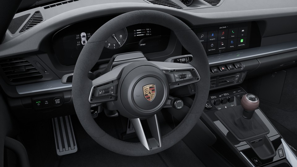 带哑光碳纤维饰板的 Race-Tex 面料加热式 GT 运动型方向盘