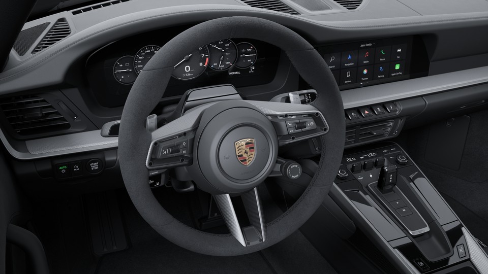 带哑光碳纤维饰板的 Race-Tex 面料加热式 GT 运动型方向盘