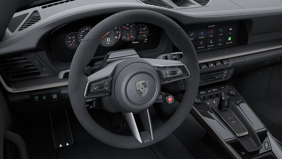 带哑光碳纤维饰板的 Race-Tex 面料加热式 GT 运动型方向盘