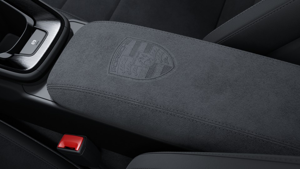 Porsche crest on storage compartment lid Race-Tex
