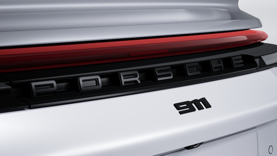 ‘911’ logo painted in Black (high-gloss)