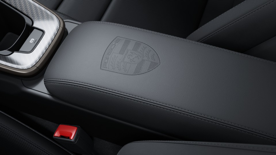 Porsche crest on storage compartment lid