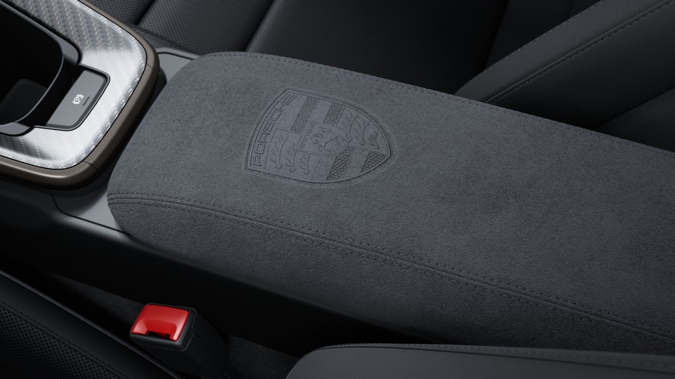 Porsche crest on storage compartment lid Race-Tex