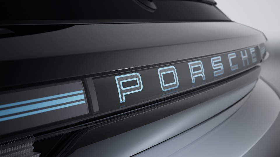 带冰川蓝 “PORSCHE” 标志的深色条形尾灯