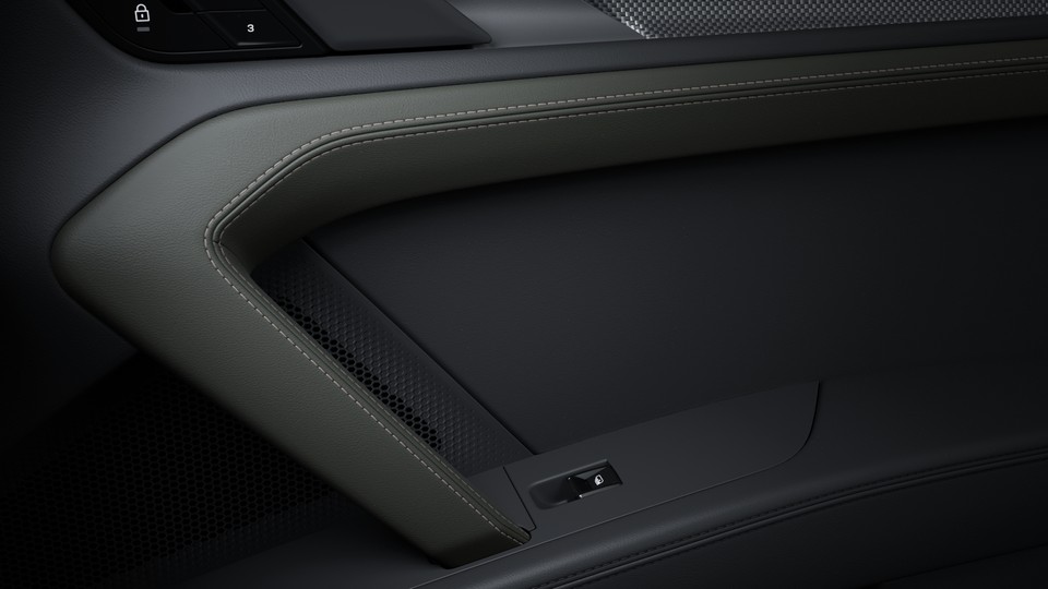 Extended trim package with grab handles leather turbonite with coloured decorative stitching