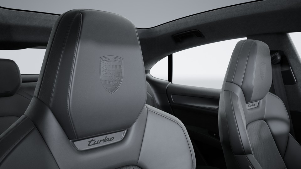 Porsche crest on headrests front seats