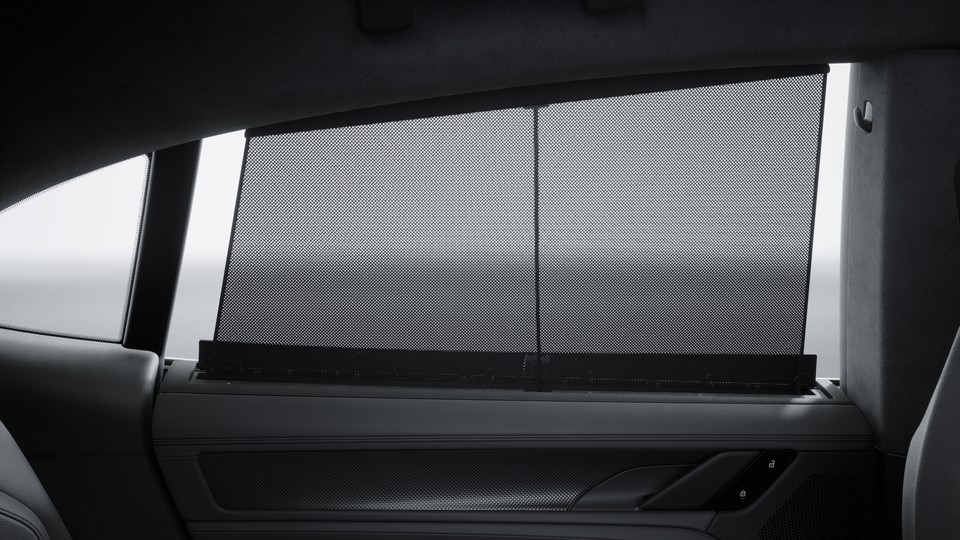 Electric roll-up sunblind for rear side windows