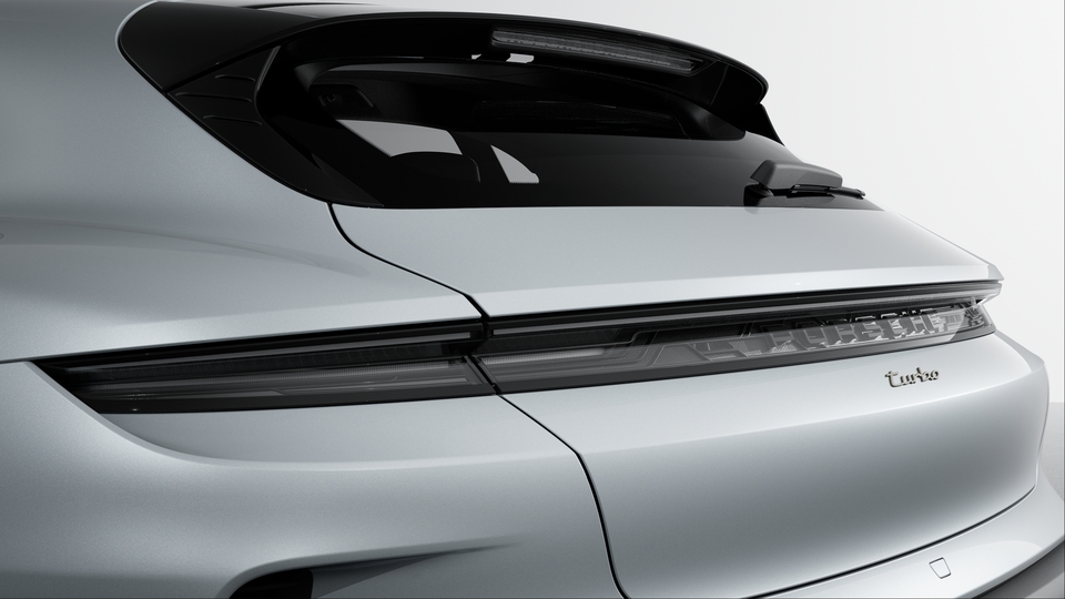 Faixa de luz com logotipo "PORSCHE" em preto.