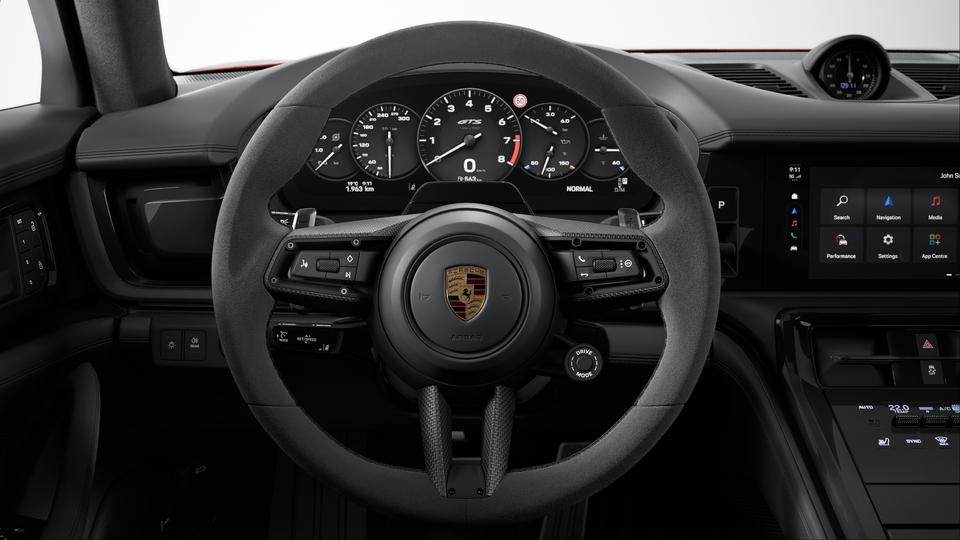 带哑光碳纤维饰板的 Race-Tex 面料加热式 GT 运动型方向盘